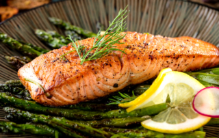grilled salmon filet, with asparagus and lemon