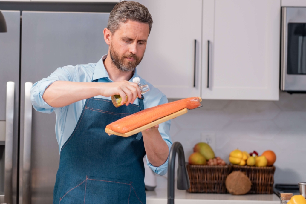 A man prepping Alaskan Recipes.