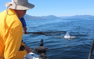 An angler enjoying Vacation Rental Amenities.
